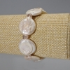 Pulsera de perlas barrocas con tono 'gasolina', diámetro 19 mm ±, longitud 18 cm ± (elástica) con cristales de Swarovski