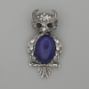 Broche-pendiente en forma de búho con lapislázuli 60x29 mm ±, con cristales negros y metal plateado