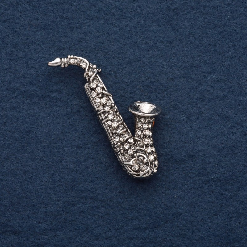 Broche 'Saxofón' 5x2 cm, metal gris