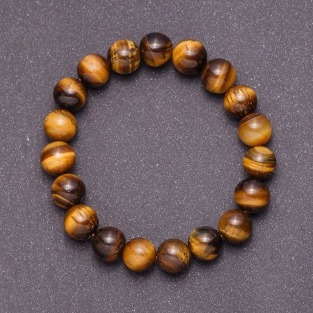 Pulsera de ojo de tigre de 12 mm en goma elástica