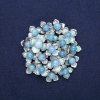 Broche de Flores con Aguamarina, esmalte azul claro, metal plateado 60×62 mm