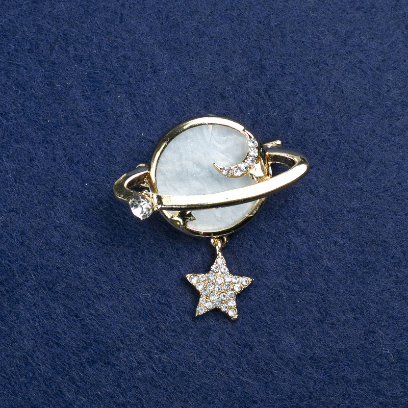 Broche Planeta con madreperla y strass 36x38 mm +