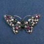 Broche mariposa multicolor con strass, metal plateado 70×39